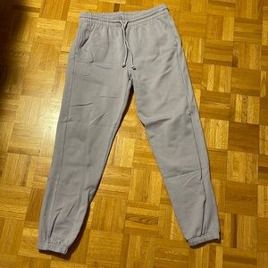 Aritzia cozy fleece boyfriend sweatpants.